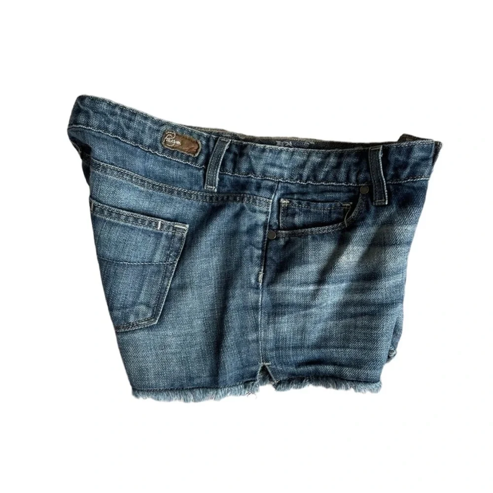 PAIGE Medium Wash Cut Off Raw Hem Jeans Shorts